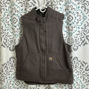 Vest never worn size Large color it’s like a light lavander